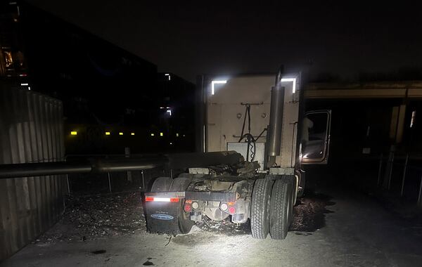 A tractor-trailer was damaged in a collision with a train Monday night.