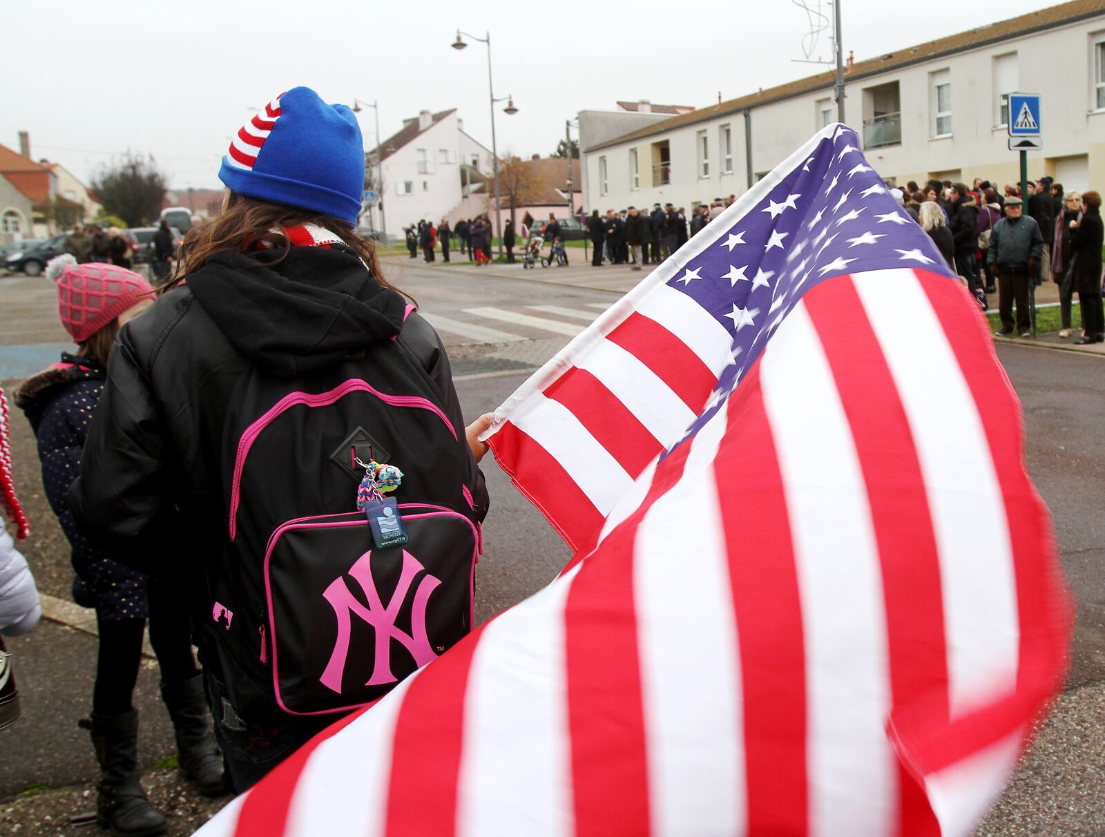 Children in the small town of Créhange, France watched as American veterans of the 95th Infantry took part in a parade to celebrate the city's liberation from German forces during WWII. RYON HORNE/RHORNE@AJC.COM