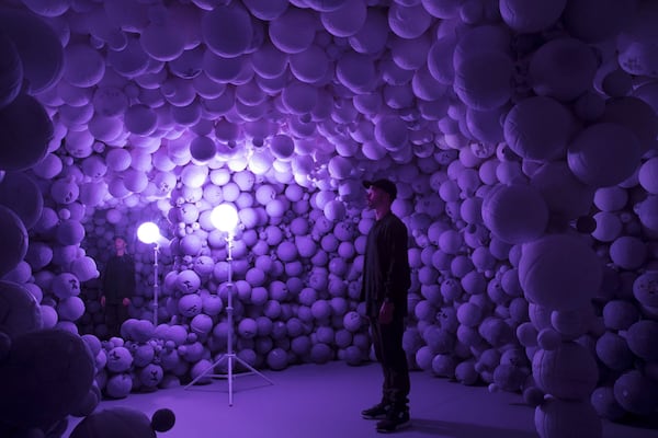 “Daniel Arsham: Hourglass,” a new show at the High Museum, includes this cavern of lavender spheres. The purple balls are replicas of basketballs and volleyballs, cast in a mixture of gypsum and amethyst crystals. Photo: courtesy of High Museum of Art.