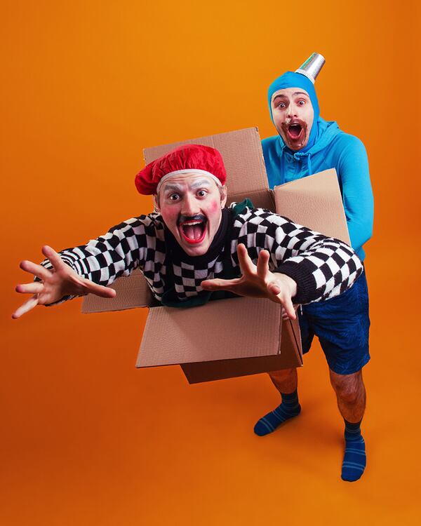 As the clown troupe Oldest and Dearest, Georgia resident Miles Calderon (left) and Levi Meltzer perform the play “Mr. Cardboard” during the 12th Atlanta Fringe Festival.