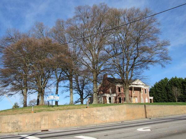 The Fowler House, a historic home built in 1926 in Marietta and now adjacent to WellStar Kennestone Hospital, will be demolished for restaurants and offices. Photos: Jennifer Brett, jbrett@ajc.com