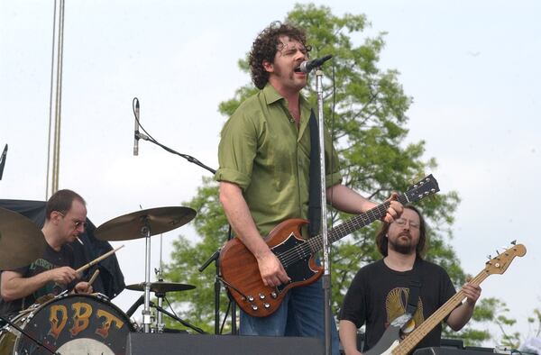 Left to right: Brad Morgan (left), Patterson Hood and Earl Hicks of the Drive-By Truckers at Music Midtown in 2003. This was just a couple of years after the band released "Southern Rock Opera." (Kimberly Smith/staff)