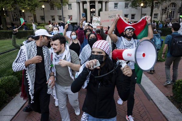 FILE - Palestinian supporters, including Mahmoud Khalil, second from left, demonstrate during a protest at Columbia University, Thursday, Oct. 12, 2023, in New York. (AP Photo/Yuki Iwamura, File)