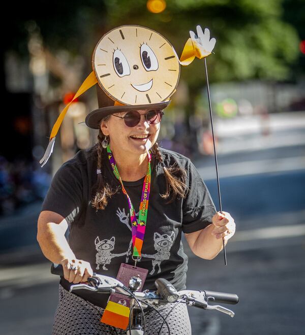 Chantelle Rytter rides her bike along Peachtree Street ahead of the Dragon Con Parade on Saturday, September 4, 2021, in Atlanta. STEVE SCHAEFER FOR THE ATLANTA JOURNAL-CONSTITUTION