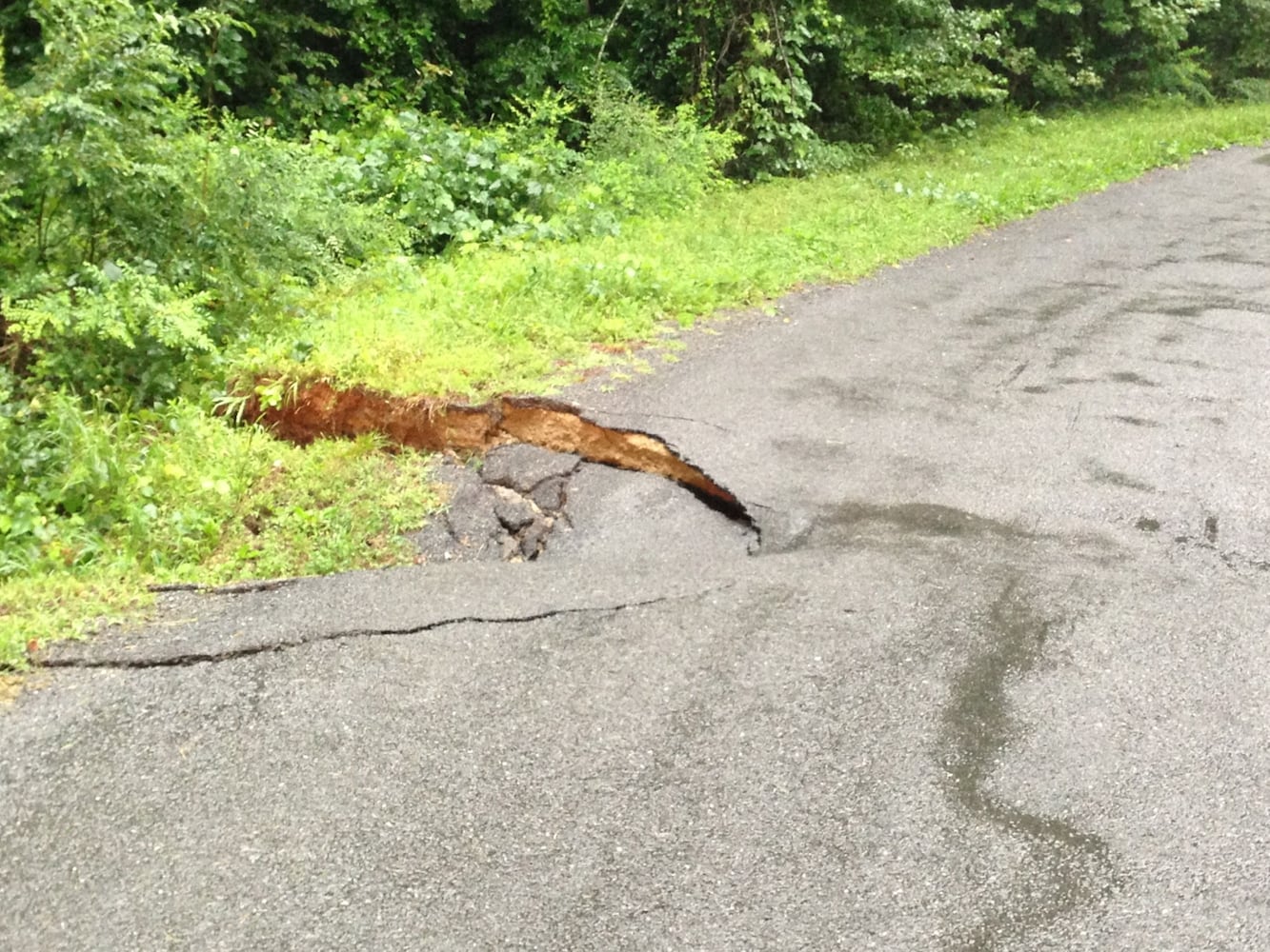 Atlanta Weather| Rain causes road damage, flooding in metro area