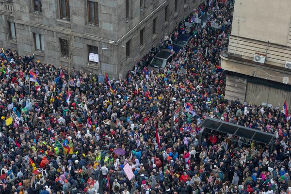 Crowds gather during a major anti-corruption rally led by university students in Belgrade, Serbia, Saturday, March 15, 2025. (AP Photo/Marko Drobnjakovic)