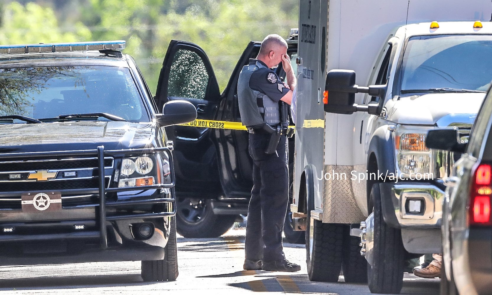 3 officers injured, suspect dead after chase, shooting in Carroll County