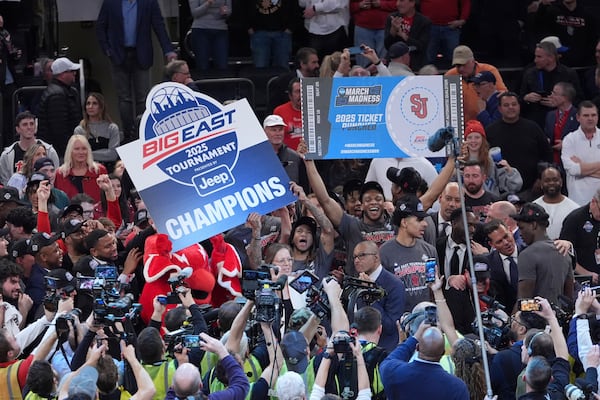 St. John's celebrates after an NCAA college basketball game against Creighton in the championship of the Big East Conference tournament Saturday, March 15, 2025, in New York. (AP Photo/Frank Franklin II)