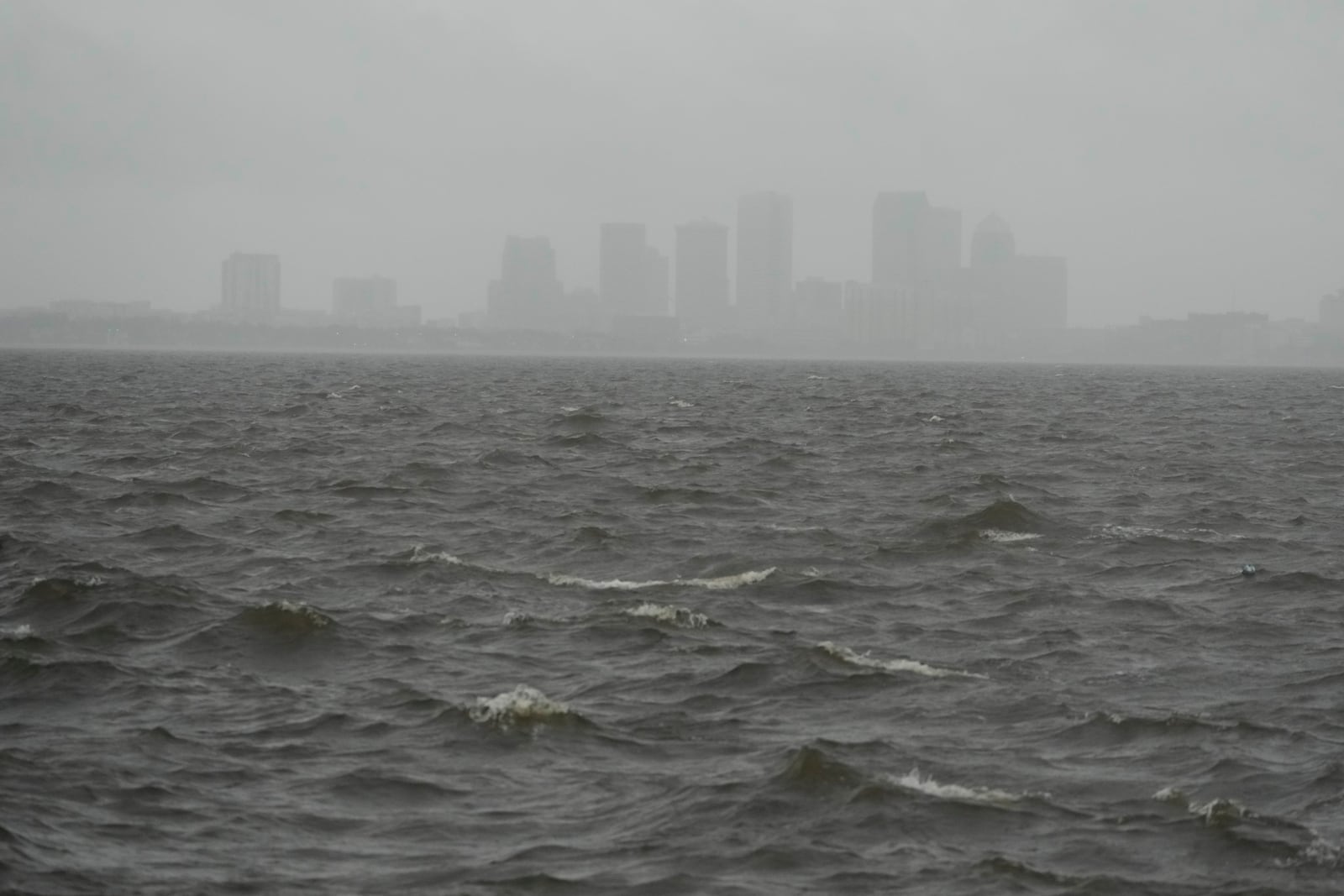 Rain begins to fall ahead of the arrival of Hurricane Milton, Wednesday, Oct. 9, 2024, in Tampa, Fla. (AP Photo/Julio Cortez)