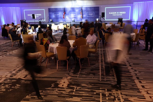 People start arriving at the election night celebration night at the Hyatt Regency hotel to support Kasim Reed. Miguel Martinez for The Atlanta Journal-Constitution 