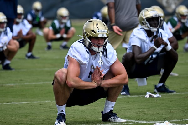 Georgia Tech's tight end Dylan Leonard (center) warms up during a training camp at Georgia Tech’s Rose Bowl Field, Tuesday, August 1, 2023, in Atlanta. (Hyosub Shin / Hyosub.Shin@ajc.com)