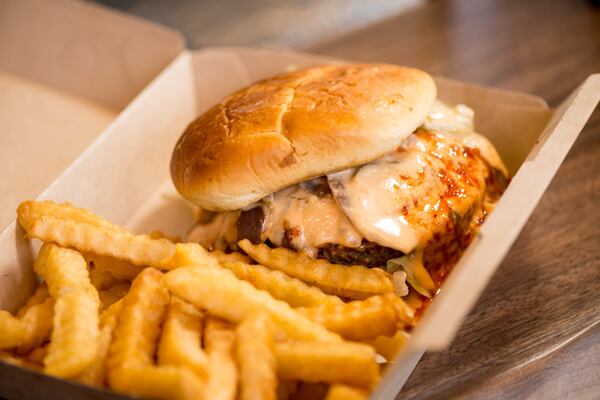 Sloppy Toppy plant-based patty with vegan cheese, jalapeños and spicy mayo on a Hawaiian bun. Photo credit- Mia Yakel.