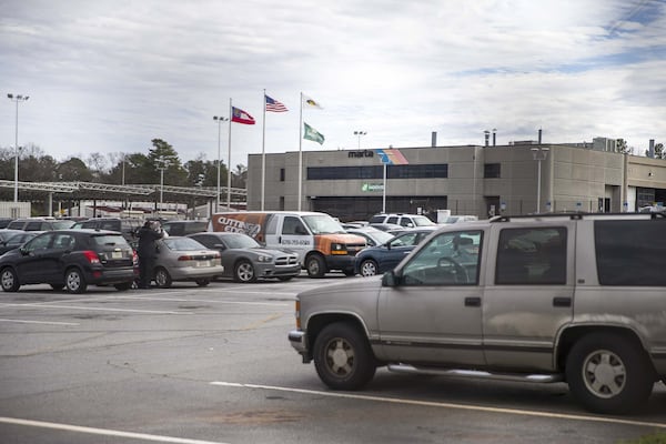 In her federal lawsuit, former MARTA employee Shyanne Lord described her co-worker, Ayodele Adenrele, following her to her car at the Laredo Drive bus facility, pictured here. She said one time he rubbed his crotch against her backside, moaning, as she struggled to get in and close the door. (Alyssa Pointer / Alyssa.Pointer@ajc.com)