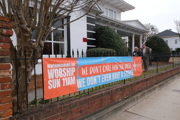 Parishioners leave church at the New Thomson United Methodist Church, which is held in a historic home in Thomson, GA, Sunday, February 18, 2024. (Nell Carroll for The Atlanta Journal-Constitution)