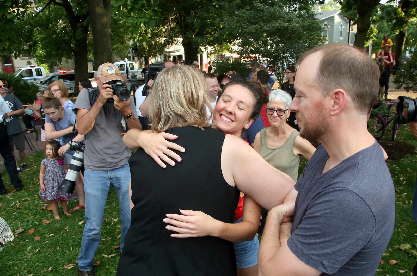 Residents of Dayton's Oregon District greeted Mayor Nan Whaley and members of the Dayton Police Department at Newcom Founders Park Tuesday during National Night Out.  The event was just three days after six Dayton police officers shot and killed a gunman in less than a minute after he opened fire near Ned Peppers bar.  LISA POWELL / STAFF