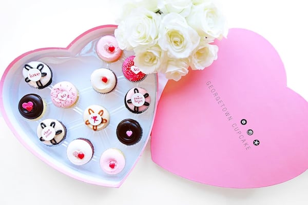 Georgetown Cupcakes offers Valentine-themed cupcakes in a heart-shaped box.