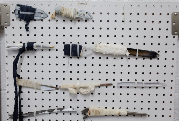 Views of makeshift weapons made by inmates in the contraband room shown at Fulton County Jail on Thursday, March 30, 2023. (Natrice Miller/ natrice.miller@ajc.com)