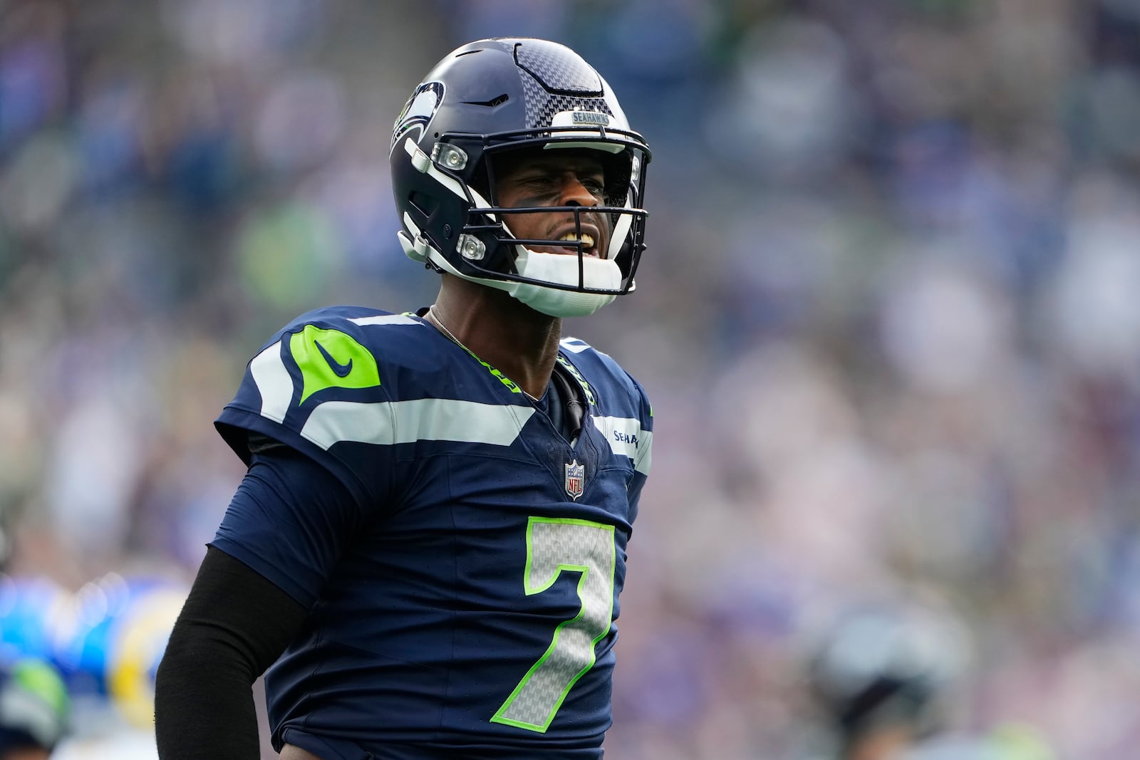 Seattle Seahawks quarterback Geno Smith (7) reacts during the first half of an NFL football game against the Los Angeles Rams in Seattle, Sunday, Nov. 3, 2024. (AP Photo/Lindsey Wasson)