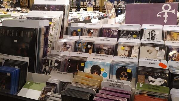 The Electric Fetus record store has a Prince-centered music display, as well as one featuring books and candles.