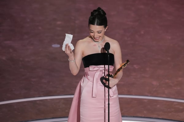 Mikey Madison accepts the award for best performance by an actress in a leading role for "Anora" during the Oscars on Sunday, March 2, 2025, at the Dolby Theatre in Los Angeles. (AP Photo/Chris Pizzello)