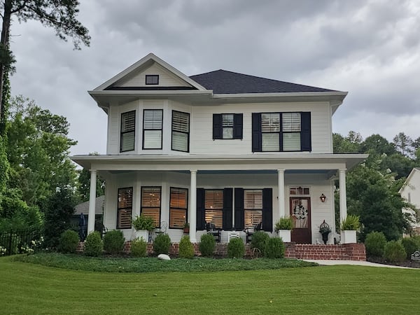 Curb appeal is essential. Tom Fulkerson, who has been in real estate for 25 years, recommends choosing mature plants and bushes for your front yard instead of just plopping in a “five-gallon-bucket holly bush” from a big box store. Photo: Courtesy of Tom Fulkerson