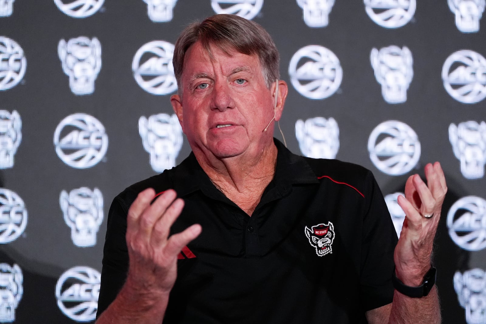 NC State head coach Wes Moore speaks during a ACC women's NCAA college basketball media day, Tuesday, Oct. 8, 2024, in Charlotte, N.C. (AP Photo/Chris Carlson)