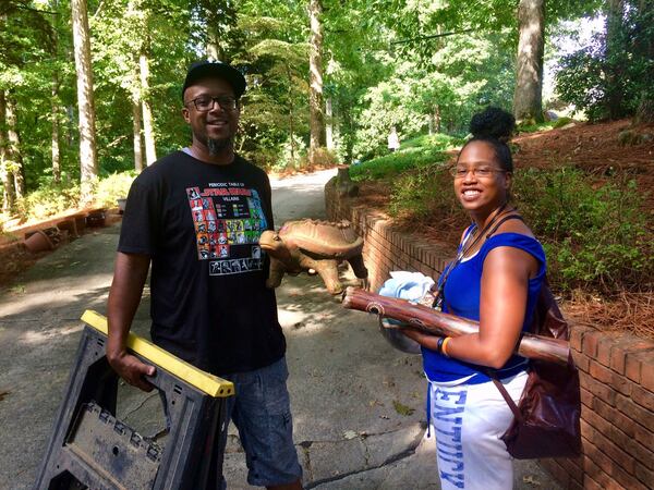 Willis and Joy Polk picked up a didgeridoo, which is an aboriginal wind instrument, and some sensible items, such as saw horses. Photo by Bill Torpy