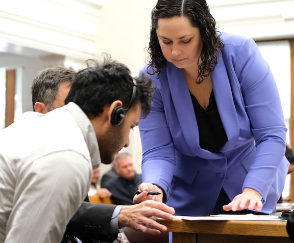 Defense attorneys Kaitlyn Beck and John Donnelly present the not guilty plea for Jose Ibarra to sign. Jose Ibarra appeared in court May 31, 2024 in Athens, Ga. Ibarra, who used a translator during the proceedings, is the man charged with the Feb. 22 murder of Laken Riley on the University of Georgia's campus (Nell Carroll for The Atlanta Journal-Constitution)