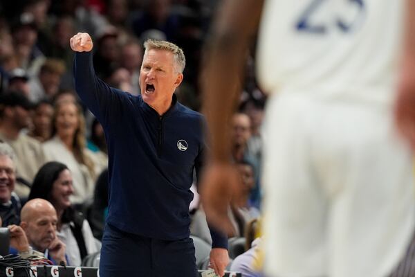 Golden State Warriors head coach Steve Kerr yells during the second half of an NBA basketball game against the Charlotte Hornets on Monday, March 3, 2025, in Charlotte, N.C. (AP Photo/Chris Carlson)