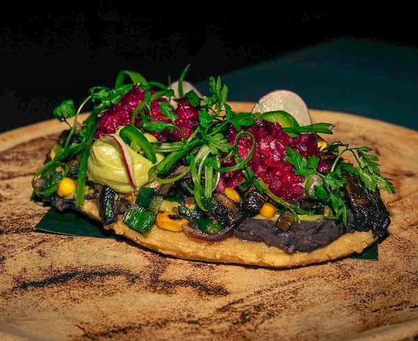 The huarache camino real at Pata Negra is a vegetarian dish with mushrooms, corn and beans served over a thick masa tortilla. (Courtesy of Pata Negra)