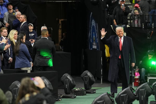 President Donald Trump attends the finals at the NCAA wrestling championship, Saturday, March 22, 2025, in Philadelphia. (AP Photo/Matt Rourke)