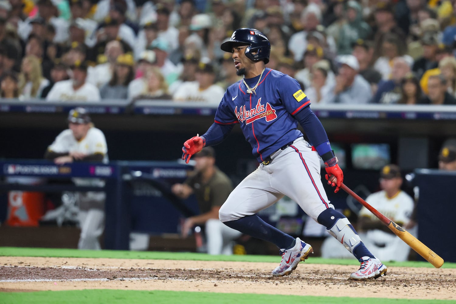 Atlanta Braves’ Ozzie Albies (1) hits a fielder’s choice single as Michael Harris is out at second base during the sixth inning of National League Division Series Wild Card Game Two against the San Diego Padres at Petco Park in San Diego on Wednesday, Oct. 2, 2024.   (Jason Getz / Jason.Getz@ajc.com)