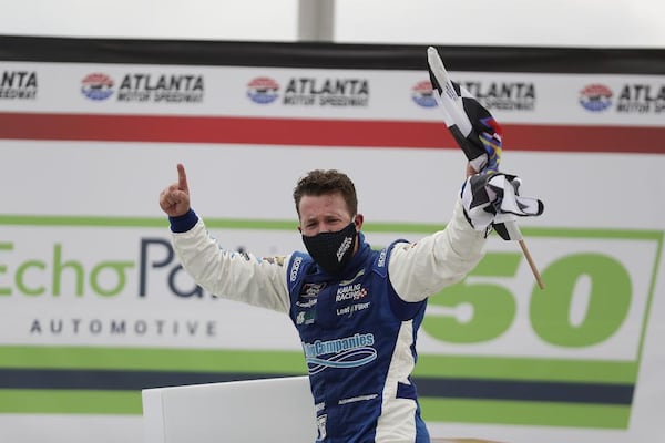 A.J. Allmendinger celebrates.