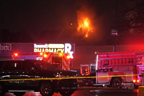 First responders work the scene after what witnesses say was a plane crash in Philadelphia, Friday, Jan. 31, 2025. (AP Photo/Matt Rourke)