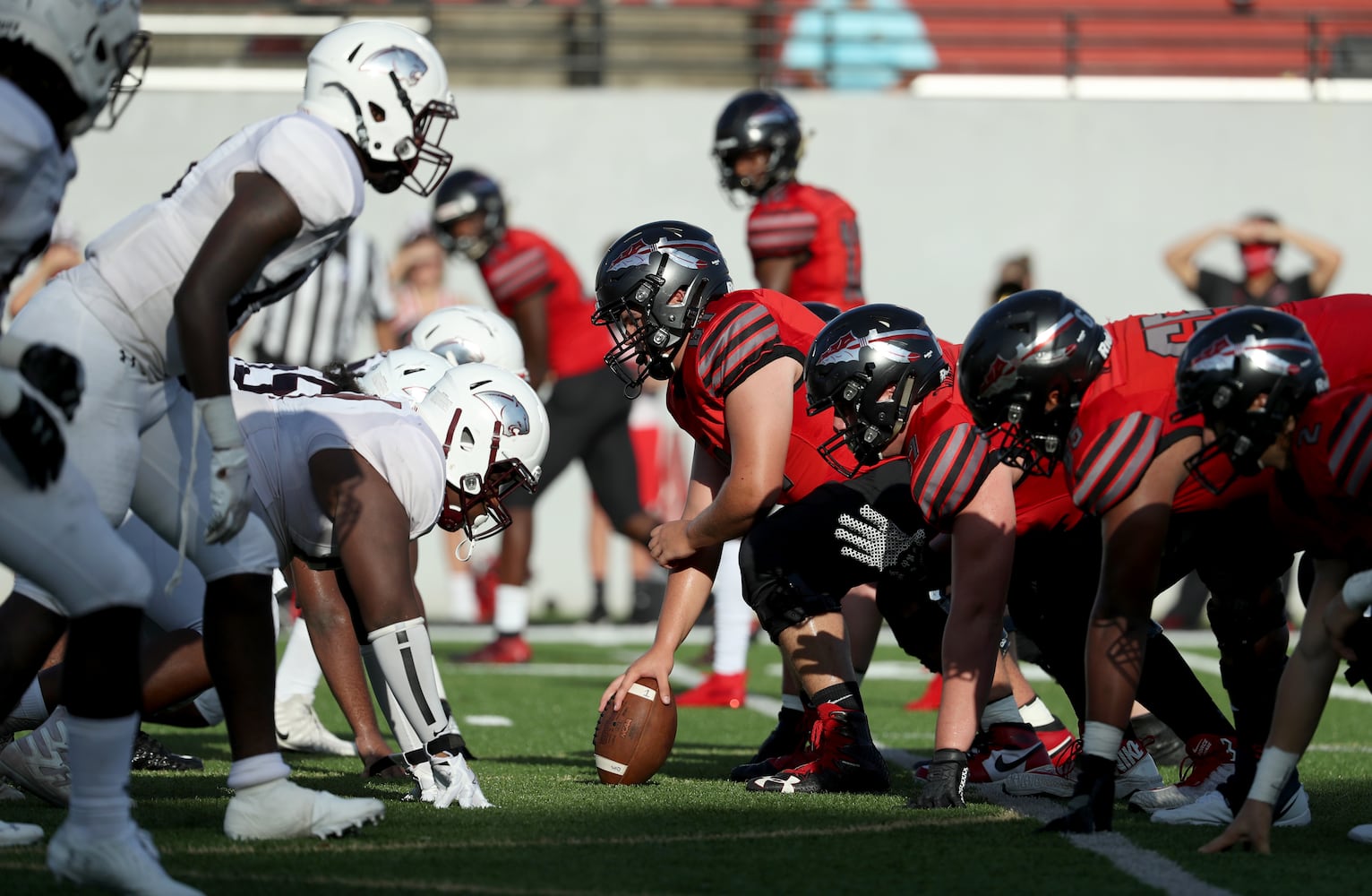 Cherokee center Ben Rice (61) prepares to snap the ball against the Carver-Atlanta defense in the first half at Cherokee high school Wednesday, September 2, 2020 in Canton, Ga.. JASON GETZ FOR THE ATLANTA JOURNAL-CONSTITUTION