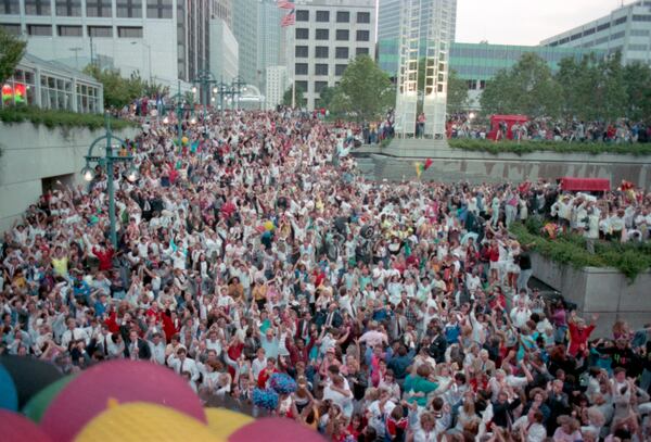 Crowds react to Atlanta being selected to host the 1996 Olympic Games during a live announcement in Underground Atlanta Tuesday, Sept. 18, 1990. 
MANDATORY CREDIT: DIANE LAAKSO / THE ATLANTA JOURNAL-CONSTITUTION