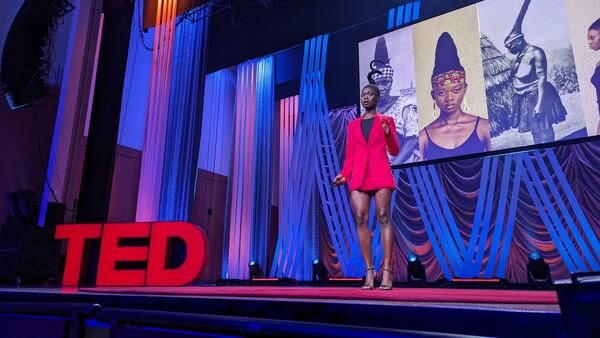 Laetitia Ky, an artist from the Ivory Coast who sculpts her hair, speaks at TEDWomen at the Woodruff Arts Center on Thursday, October 12, 2023.