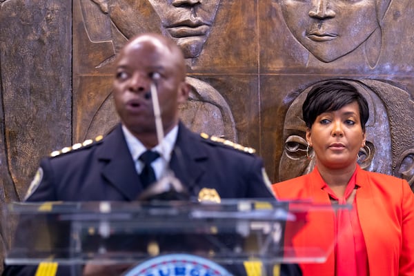 07/16/2021 — Atlanta, Georgia — Atlanta Mayor Keisha Lance Bottoms listens as Atlanta Police Chief Rodney Bryant makes remarks during a press conference to give an update on the Atlanta Anti-Violence Advisory Council at Atlanta City Hall, Friday, July 16, 2021. (Alyssa Pointer/Atlanta Journal Constitution)