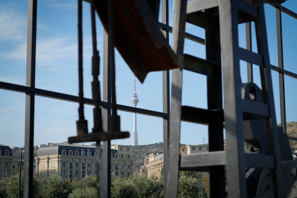 A pumpjack operates in Baku, Azerbaijan, Monday, Sept. 16, 2024. (AP Photo/Sergei Grits)