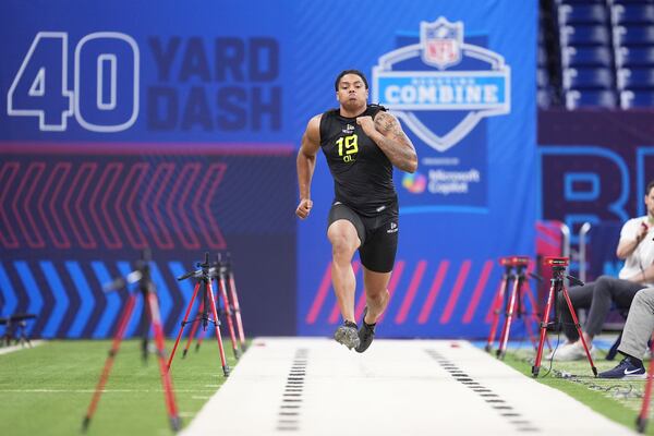 Georgia defensive lineman Tyrion Ingram-Dawkins runs the 40-yard dash at the NFL scouting combine in Indianapolis.