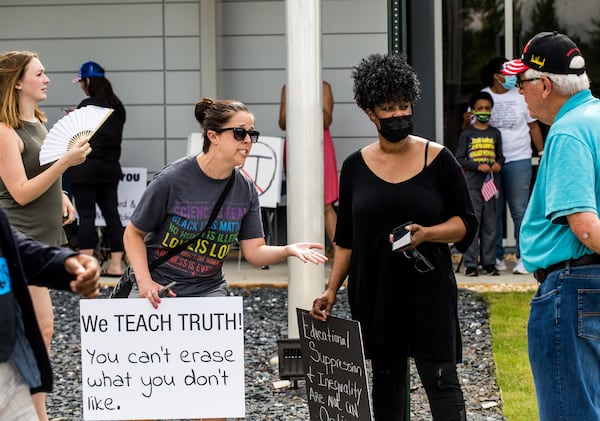 This year's campaign season is likely to turn into a new culture war over issues such as what's taught in classes and which books are on the shelves of school libraries. (Jenni Girtman for The Atlanta Journal Constitution)