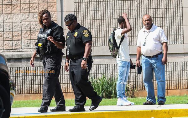 DeKalb County police were assisting DeKalb County School District police at Stephenson High School on Tuesday morning after a student reported seeing a classmate with a gun. 