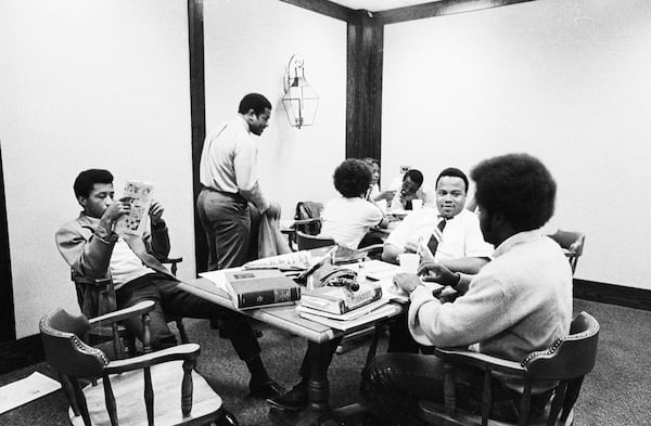 Students dining in Memorial Hall Bulldog Room and Old McWhorter Residence Hall Dining Room.