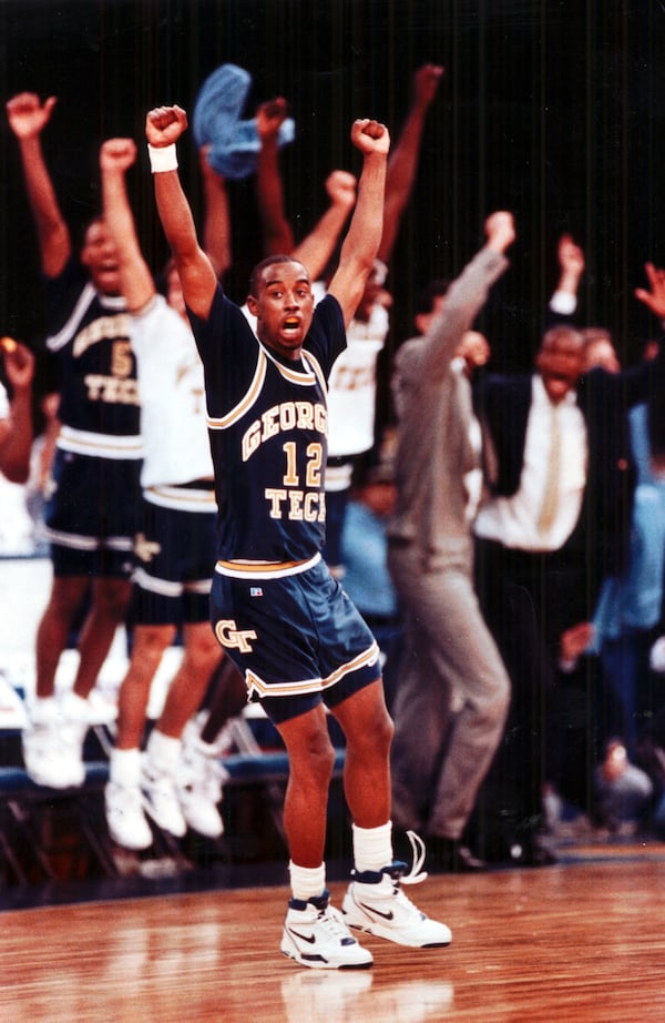 Georgia Tech guard Kenny Anderson (12) celebrates the shot that sent the game into overtime in NCAA Southeast Regional basketball action against Michigan State in New Orleans March 23, 1990. Tech won the game 81-80. (AJC file photo by Michael A. Schwarz)