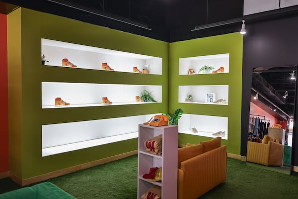 Views of the shoe wall inside of Atlanta rapper Trinidad James’ new boutique Homework located inside Underground Atlanta on March 7. (Natrice Miller/AJC)