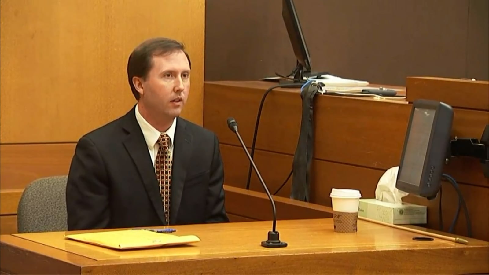 McKenzie Davenport, the chief financial officer of Arcilla Mining and Land Company, testifies during the murder trial of Tex McIver on April 11, 2018 at the Fulton County Courthouse.