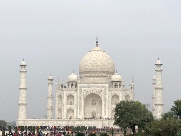 While traveling in India Sean Kelley took a side trip to the Taj Mahal. "Over the years, I have seen many pictures of this landmark, however, to see this in person is a completely different experience.  I arrived in the morning while the day was pretty gloomy; however, when the sun started coming out, the marble façade on the structure seemed to take on a completely brighter shade of white," he wrote.