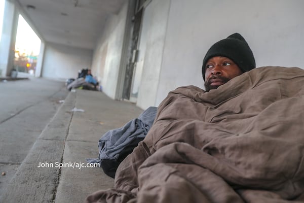 Antwan Slaton said recent cold temperatures mean more blankets as he slept overnight at the South Rhodes Center in Midtown.