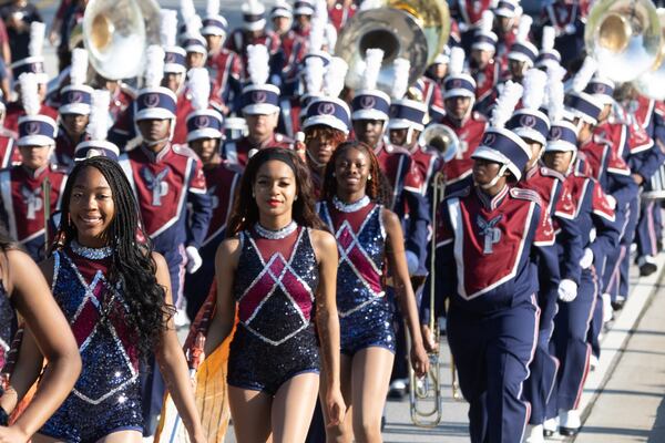 Pebblebrook High School's marching band participates in the Taste of  Mableton festival parade heading down Floyd Road on Saturday, April 15, 2023.  (Steve Schaefer/steve.schaefer@ajc.com)