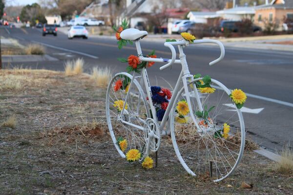 This March 20, 2025 photo shows a memorial ghost bike near the spot where Scott Dwight Habermehl was struck and fatally injured in May 2024 while biking to work at Sandia National Laboratories in Albuquerque, N.M. (AP Photo/Susan Montoya Bryan)